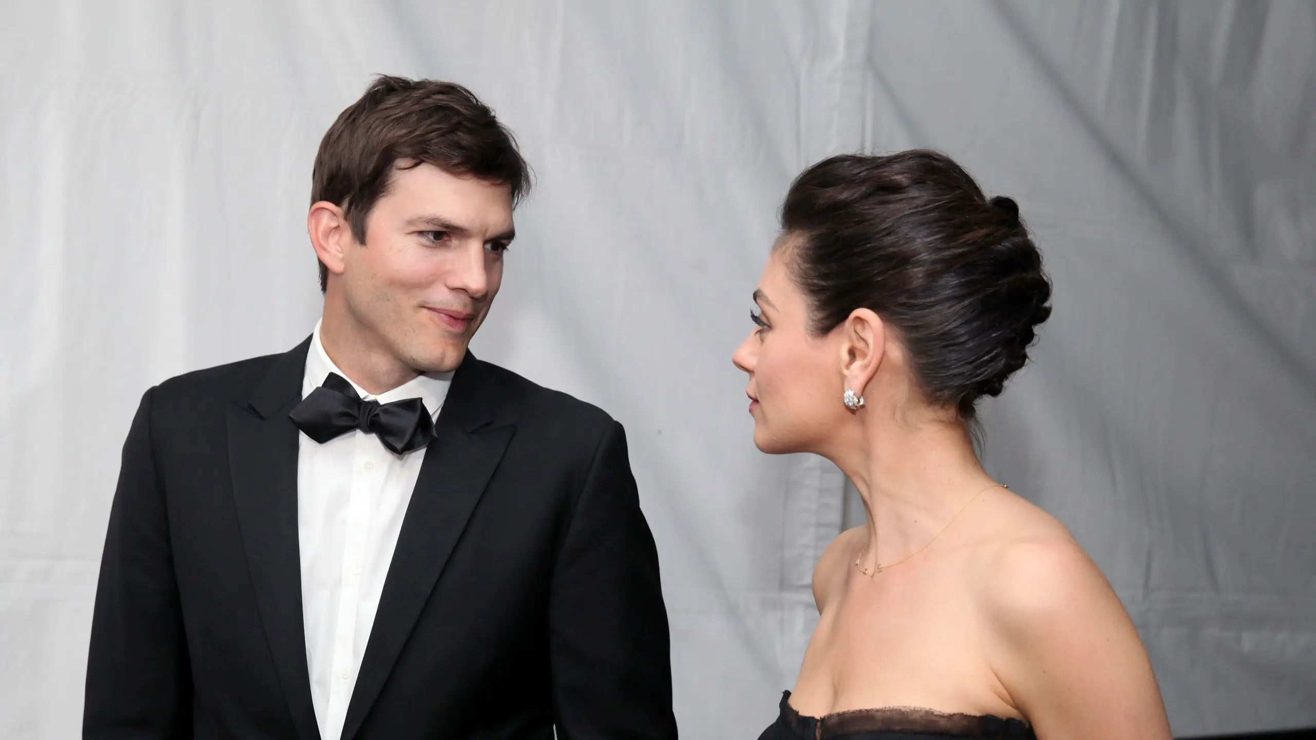 Ashton Kutcher and Mila Kunis Supporting Danny Masterson