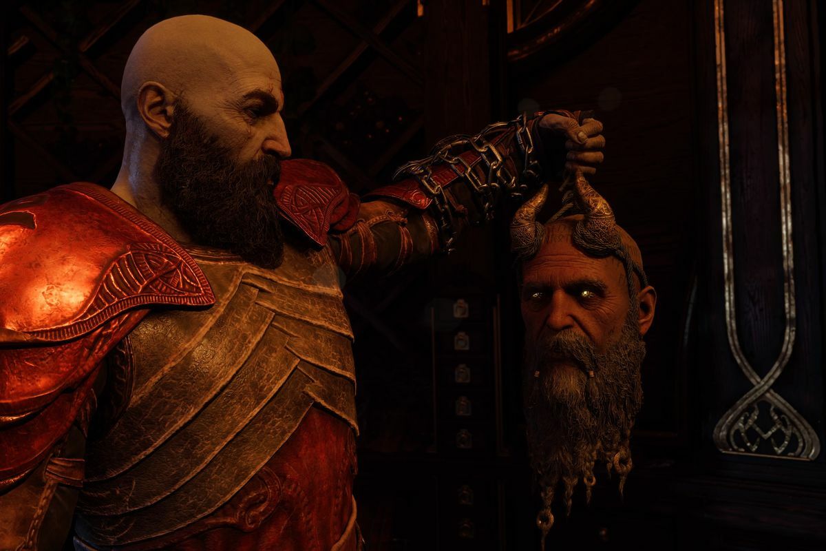 Kratos holding Mimir