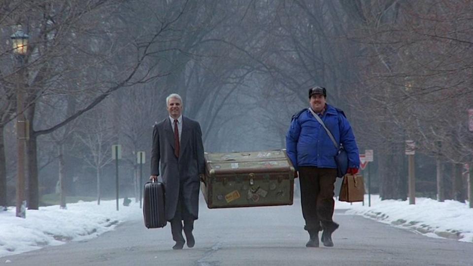 Person walking backwards in Planes Trains and Automobiles