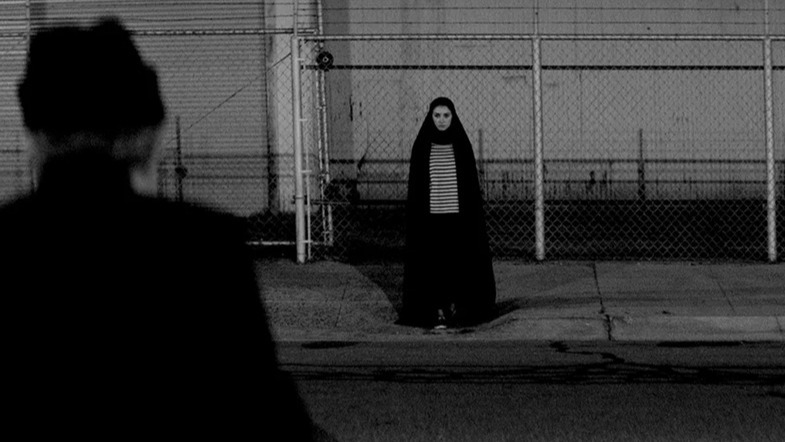 Cropped a girl walks home alone at night