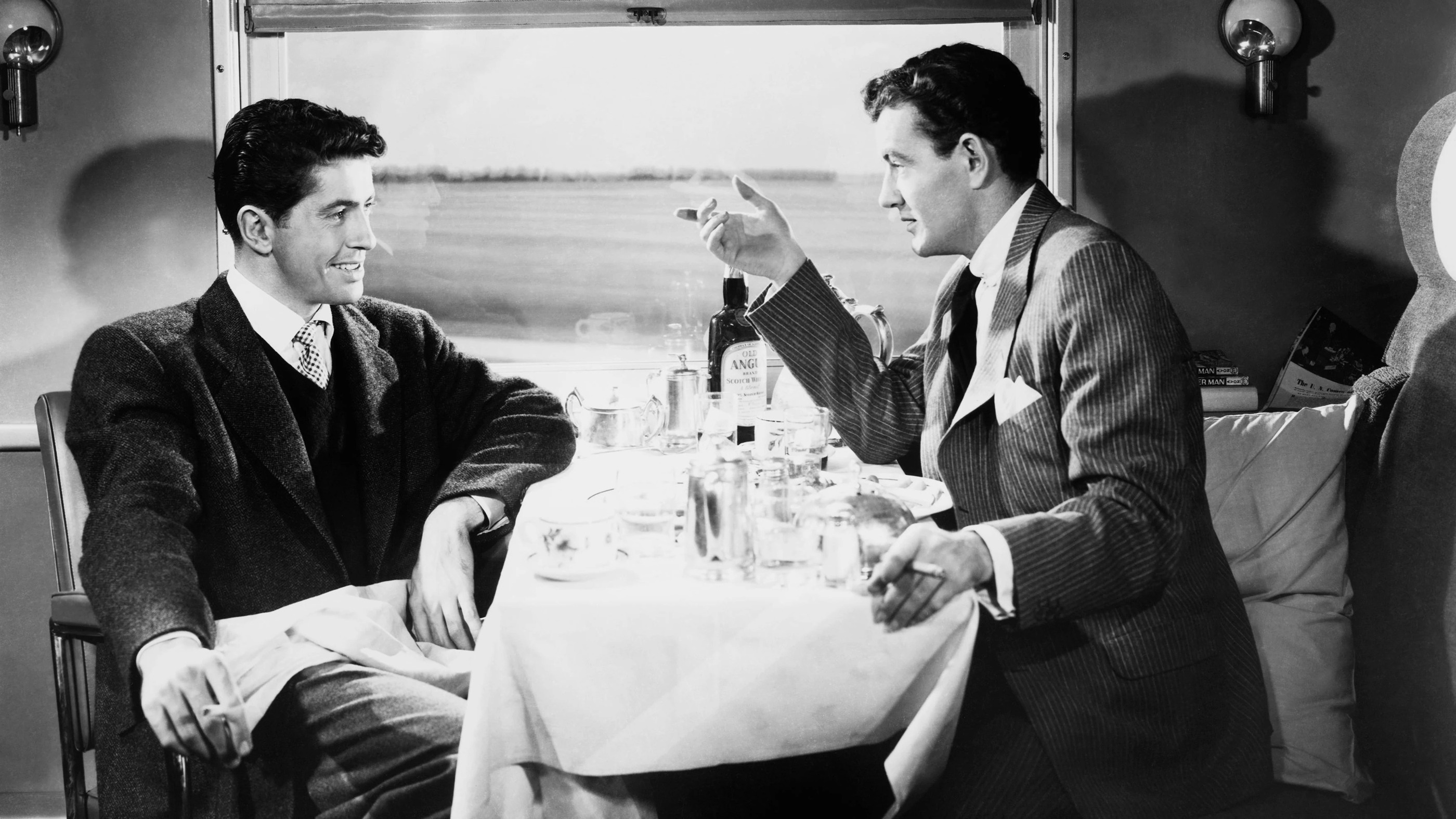 Cropped strangers on a train 1951